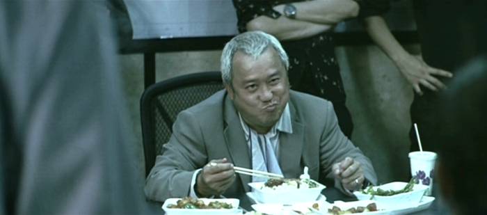 Sam (Eric Tsang Chi Wai), in control even in police headquarters