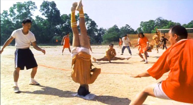 Shaolin soccer team meditating.